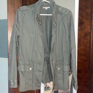 Size medium green jacket.